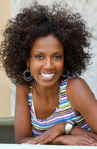 Woman with curly hair smiling